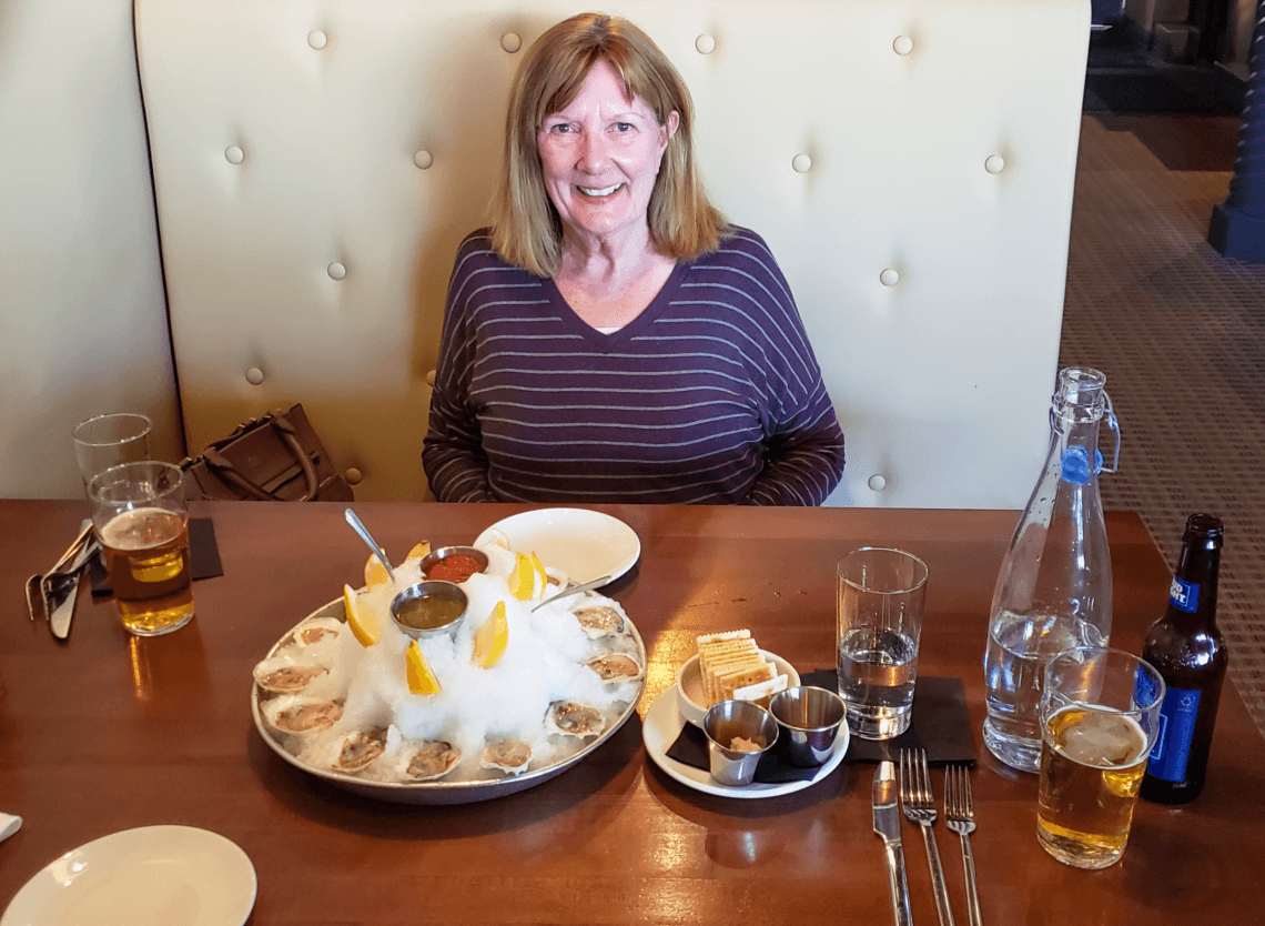 Libby Guthrie Enjoying Oysters at Harvest Restaurant